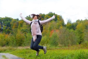 woman jumping happy diabetes